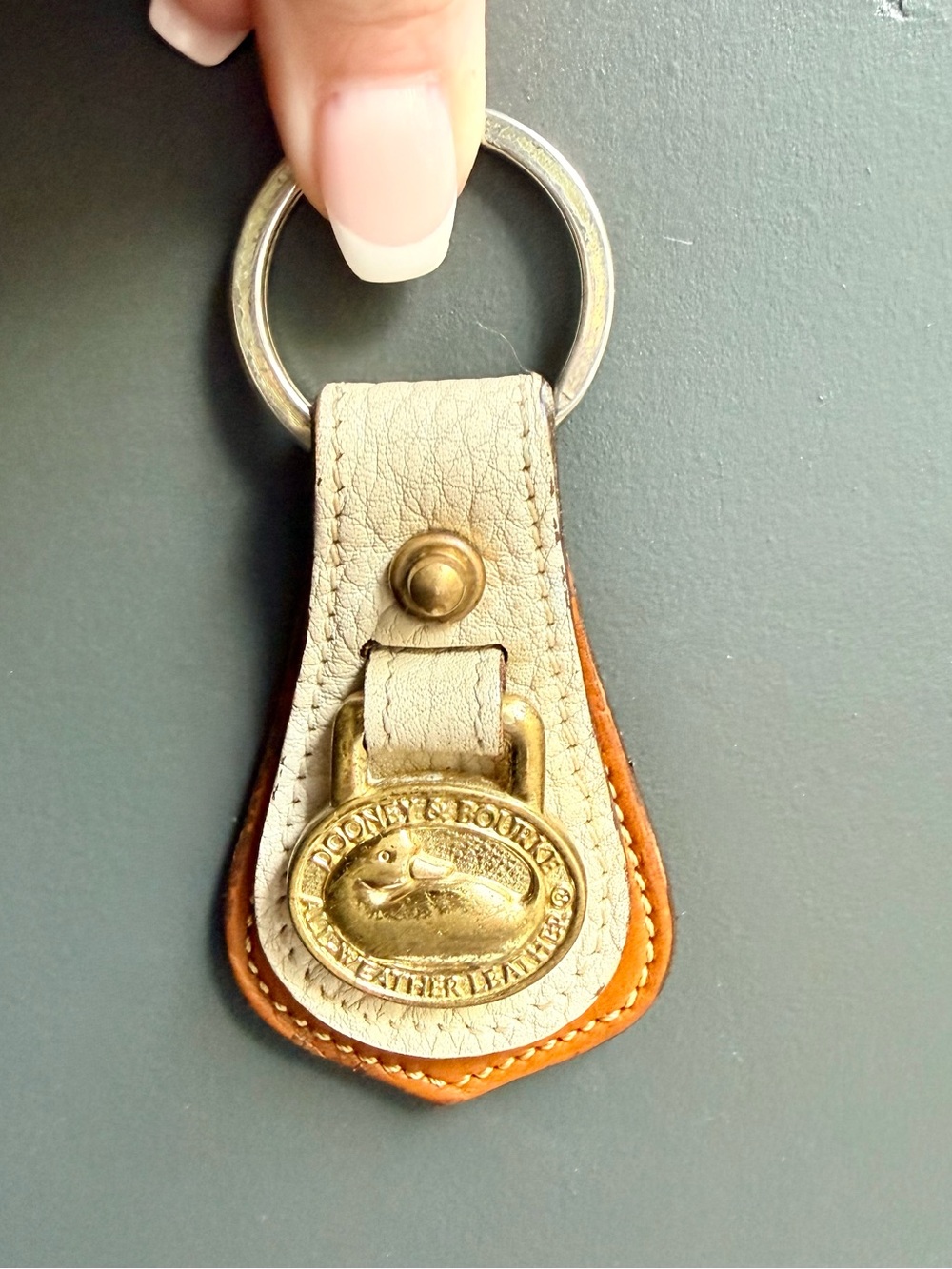Dooney and Bourke Vintage All Weather Leather Keychain Duck Logo Brass Charm